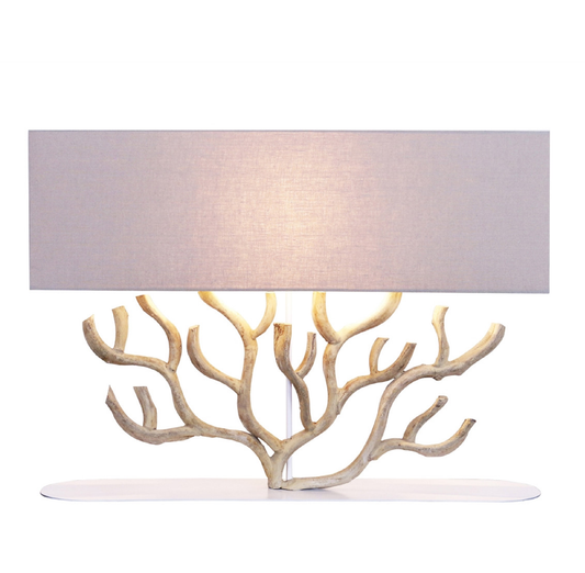 Sculptural bleached vine wood table lamp with off-white linen shade, 32 inches wide.